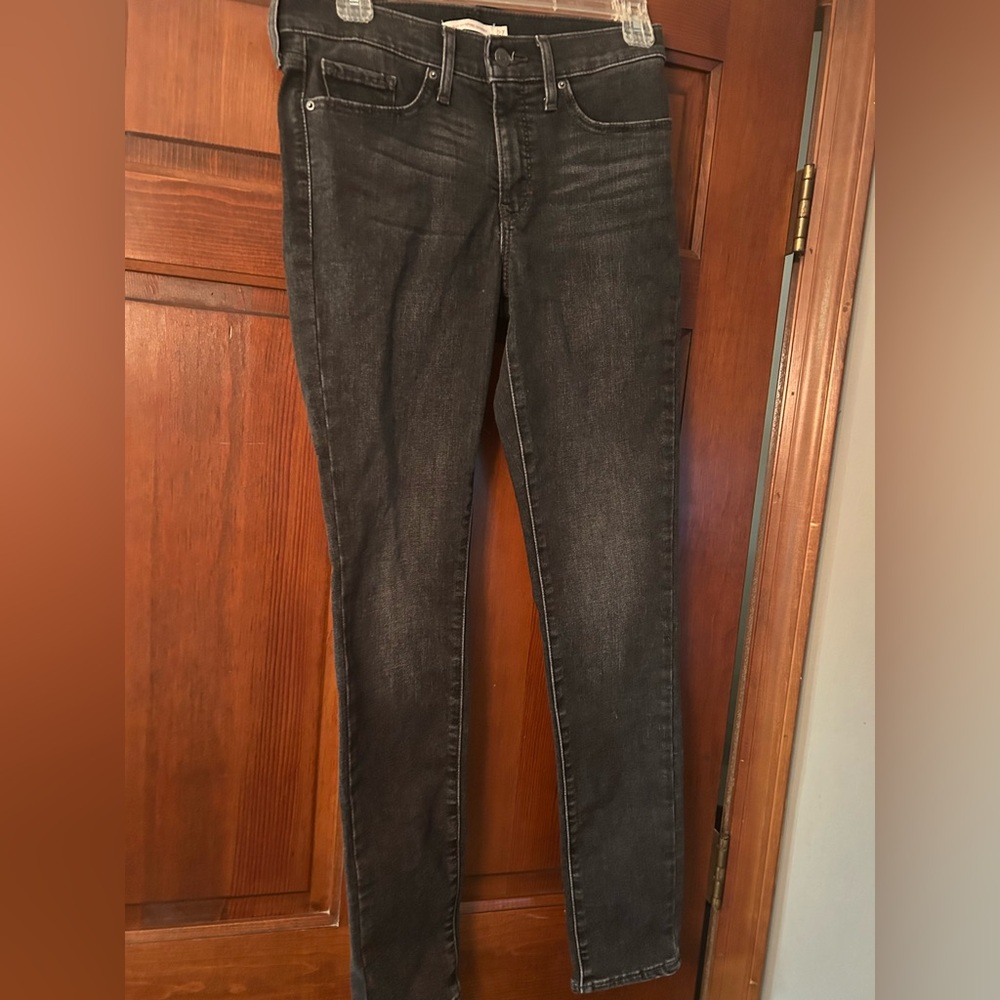 Levi’s 311 Shaping Skinny charcoal black denim jeans. Size 27 29” inseam.